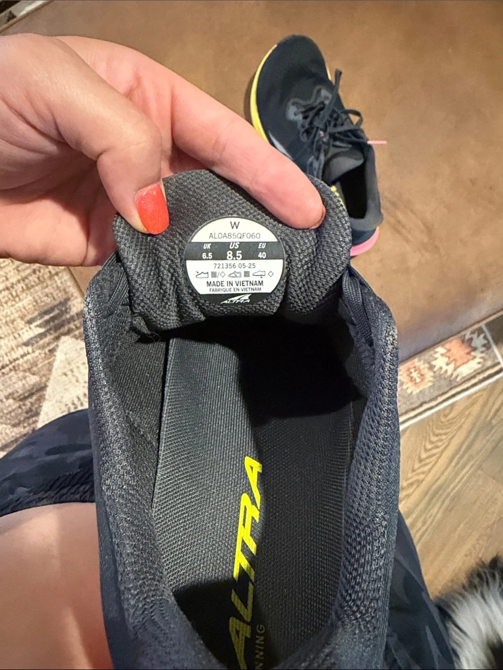 Altra Women's Black Running Shoes with Yellow and Pink Gradient Midsole Accent
